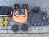 Robotas vejapjovė