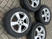Subaru Outback ratlankiai su padangomis