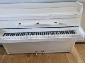 Baltas pianinas