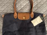 Longchamp tase,rankinukas.