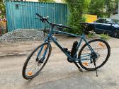 Kona Dew Plus hibiridinis miesto dviratis