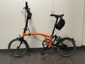 Brompton Orange Black edition with Barbour