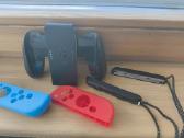 Nintendo Switch Oled su priedais.