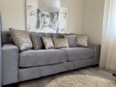 Pilka sofa-lova su miegama dalimi - nuotraukos Nr. 2