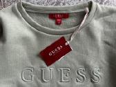 Guess megztukas