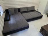 Kampinė sofa-lova su patalynės dėže