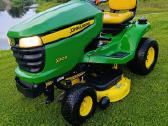John Deere X304 Visi 4 vairuojami ratai