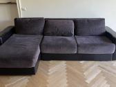 Sofa - kampas, išsitiesia į dvigulę lovą