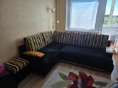 Minkštas kampinis sofa-lova su patalynės dėže