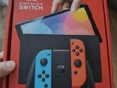 Nintendo Switch 1 Oled + dėklas + 2 Joycon caps'ai