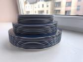 Įvairių Tupperware lėkščių rinkinys
