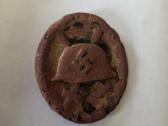 Ww 2 sužeidimo ženklas.
