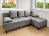 Kampinė sofa-lova su patalynės dėže