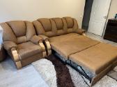 Sofa su miegamąja funkcja