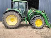 John Deere 6620 su frontaliniu krautuvu