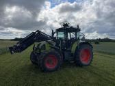 Claas Arion 640 (Cebis) su frontaliniu krautuvu - nuotraukos Nr. 2