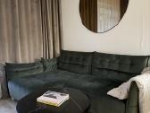 Sofa kampas su miegamuoju mechanizmu