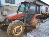 Traktorius New Holland L85 ardomas dalimis
