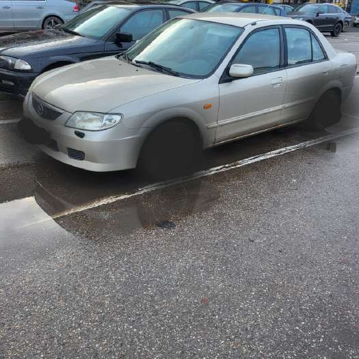 Mazda 323, 1.5 l., Седан
