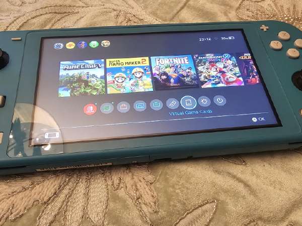 Nintendo Switch Switch light Nintendo Switch Lite Hyrule Edition + 12M NSO - Console