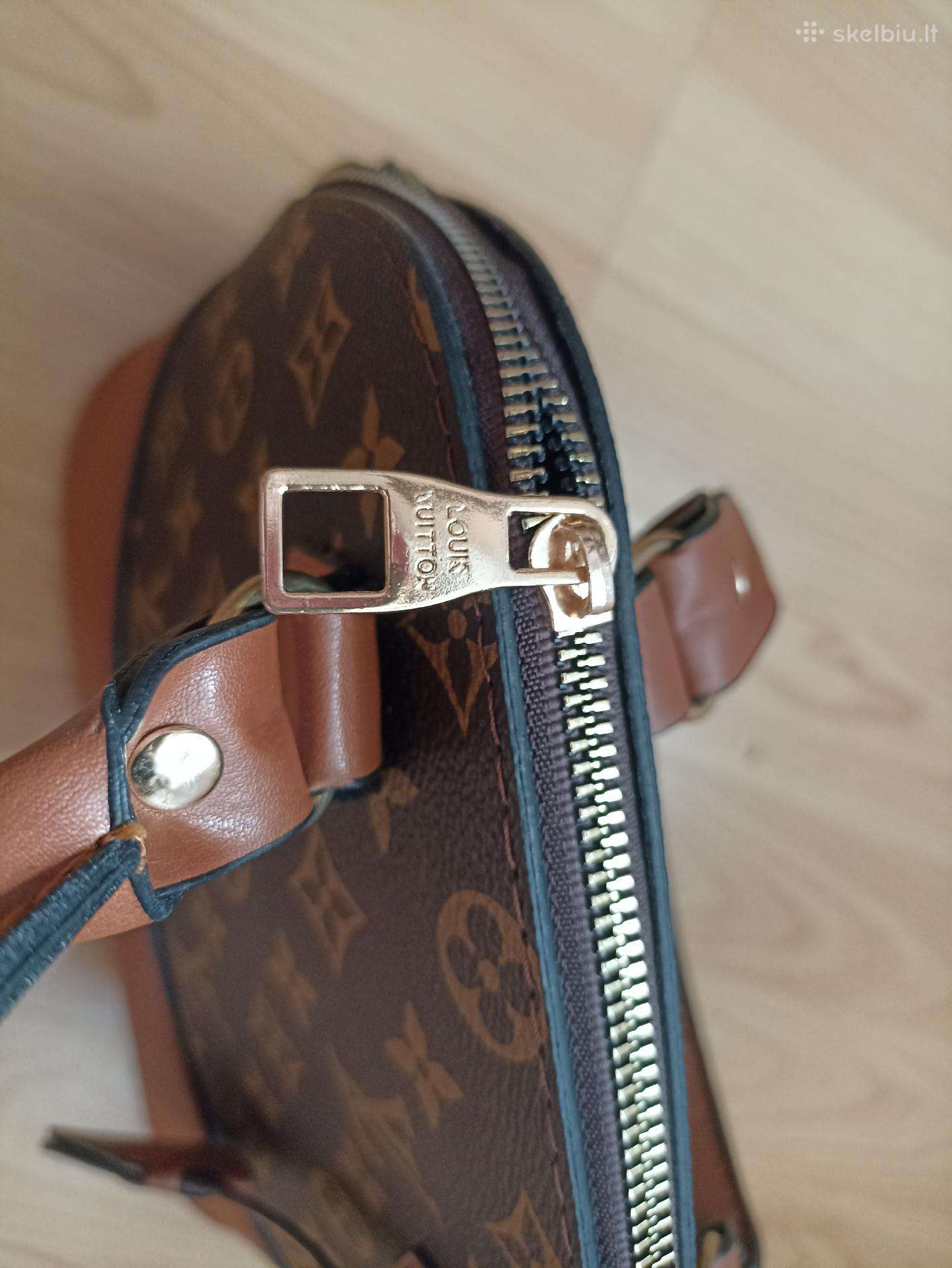 La Maree - Parduodu Louis Vuitton rankine per peti. 100%