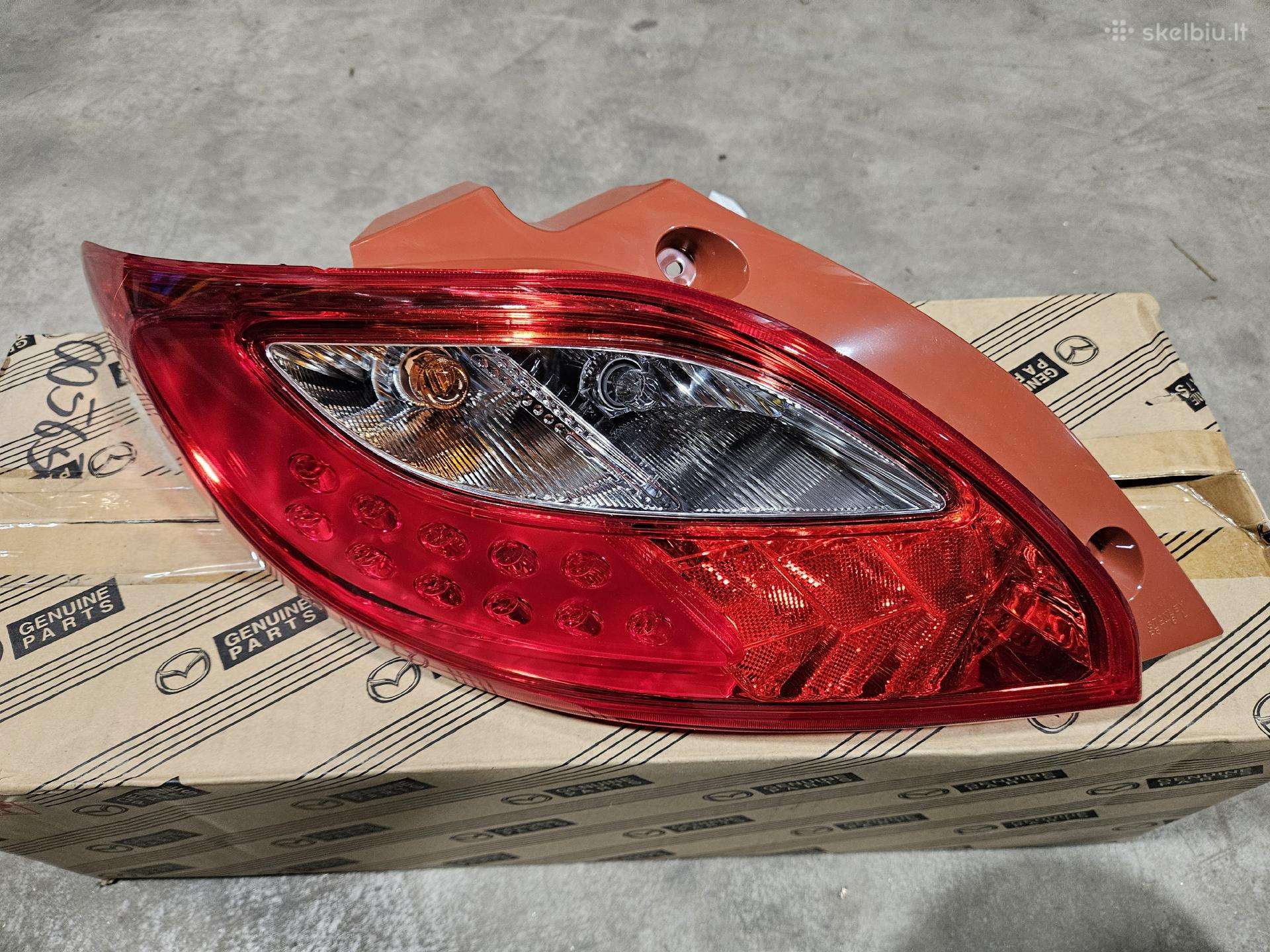 Mazda 2 Galinis žibintas kėbule Dm kairiej