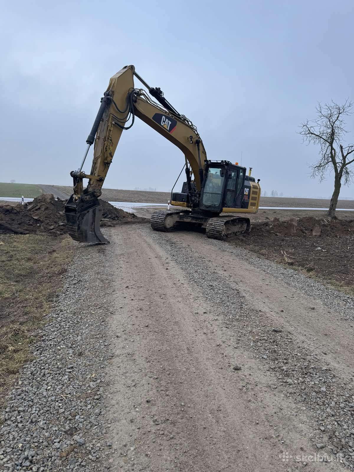 Cat 320E, экскаваторы