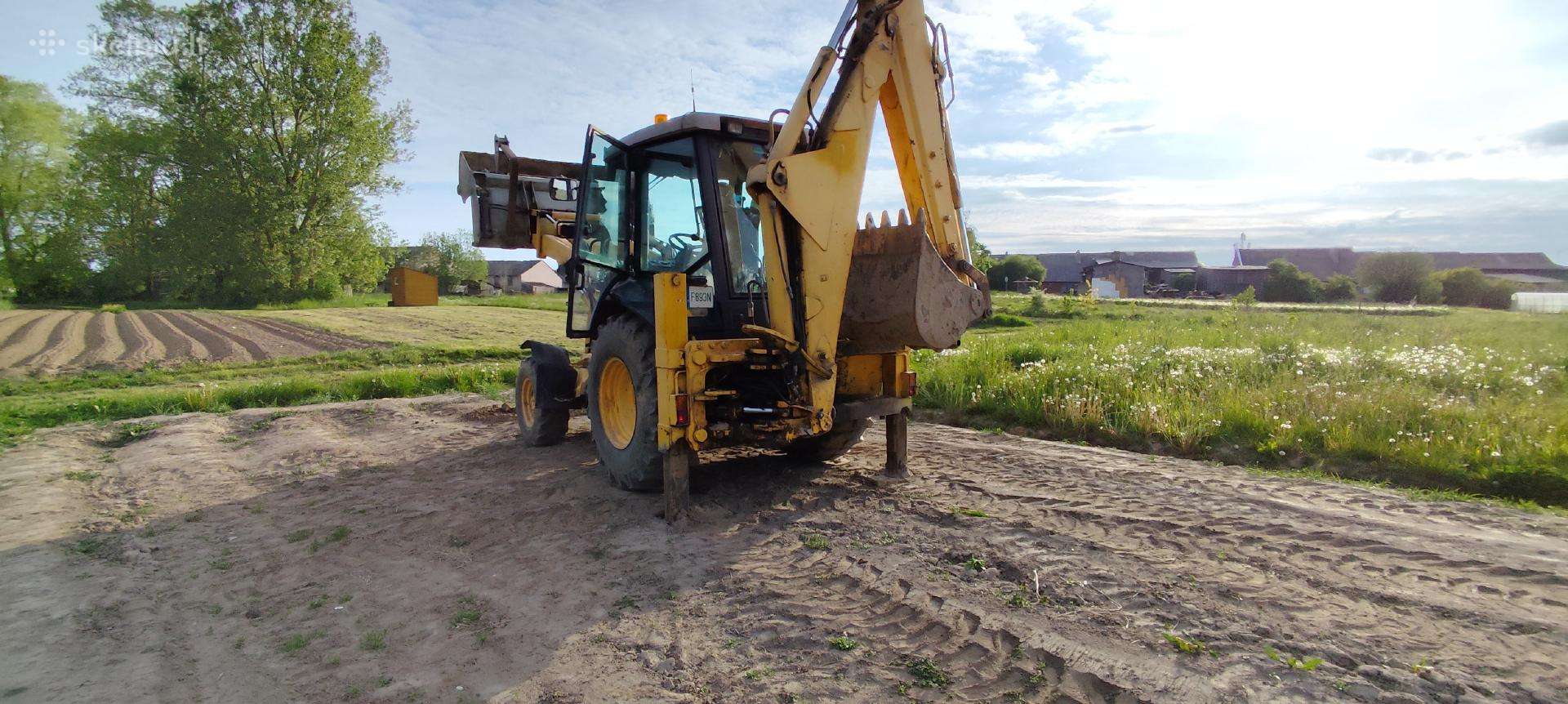 New Holland NH95, excavator loader