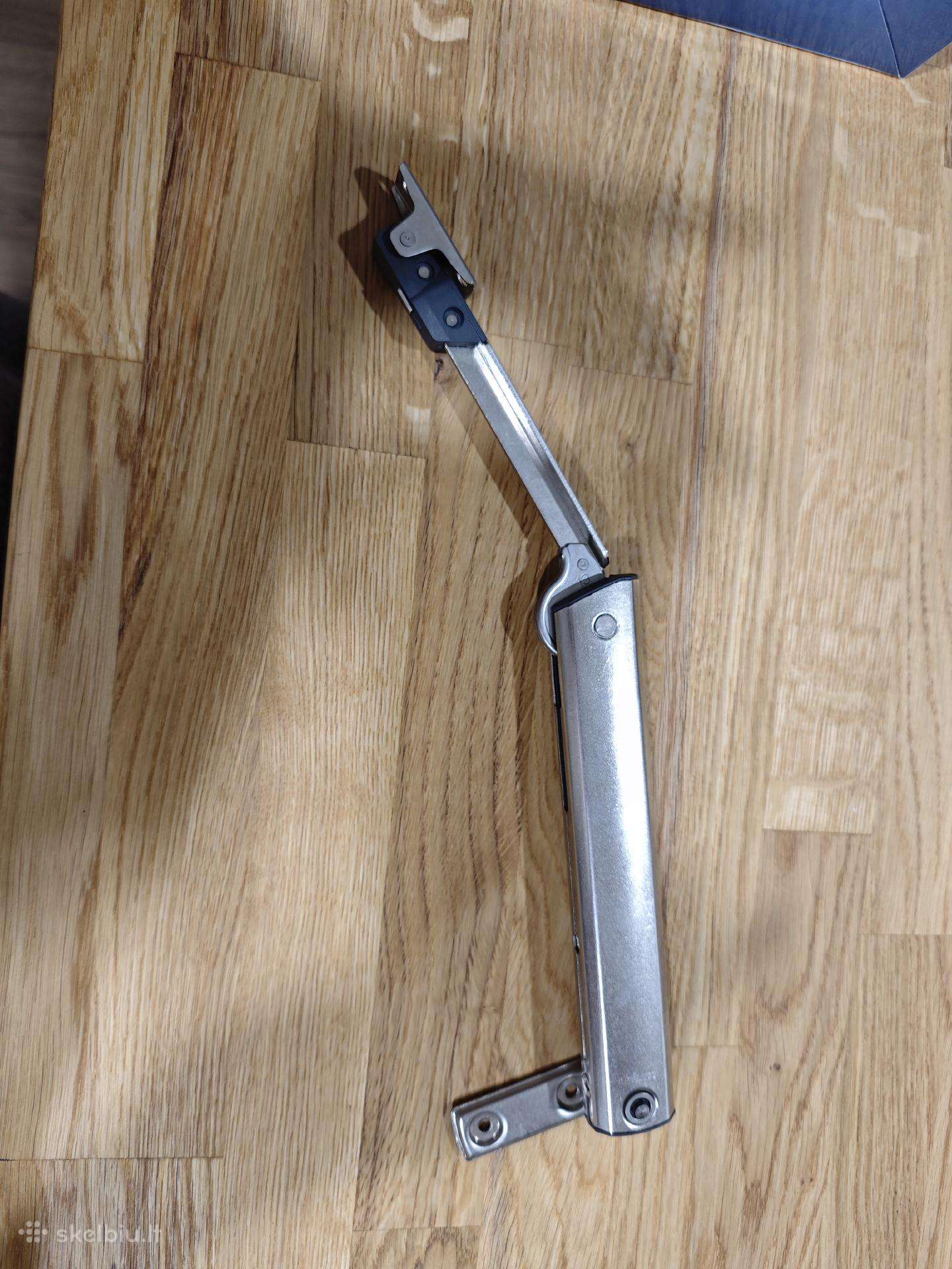 Blum pakėlimo mechanizmas