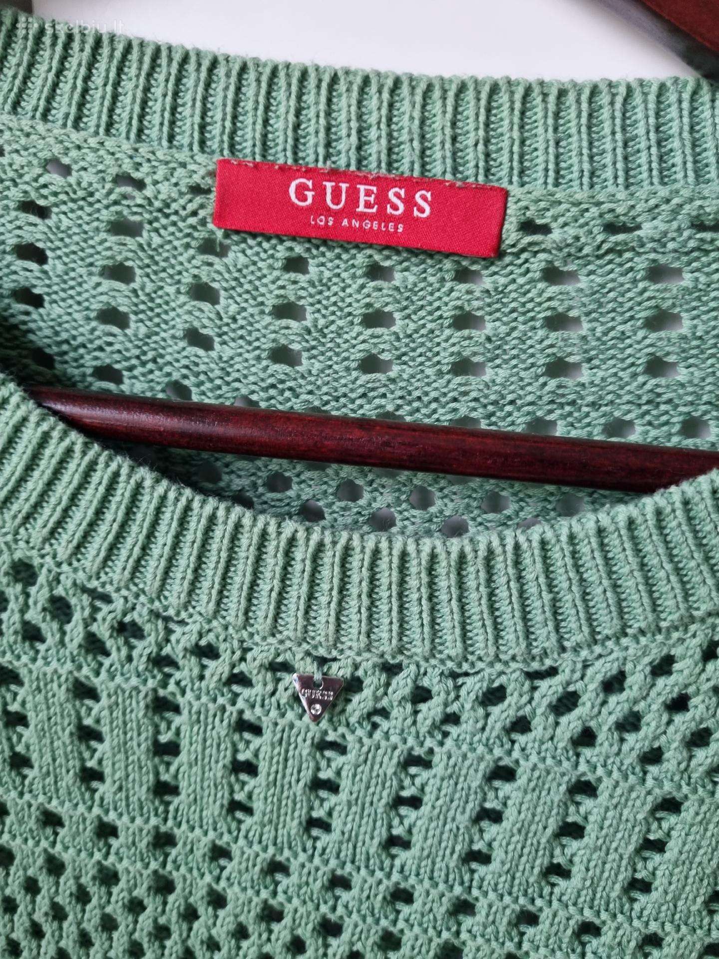 Guess megztukas