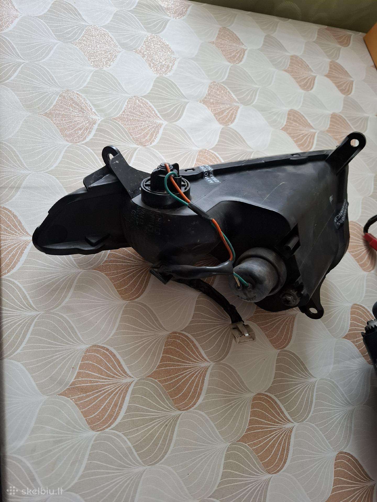 Sym motorolerio žibintai