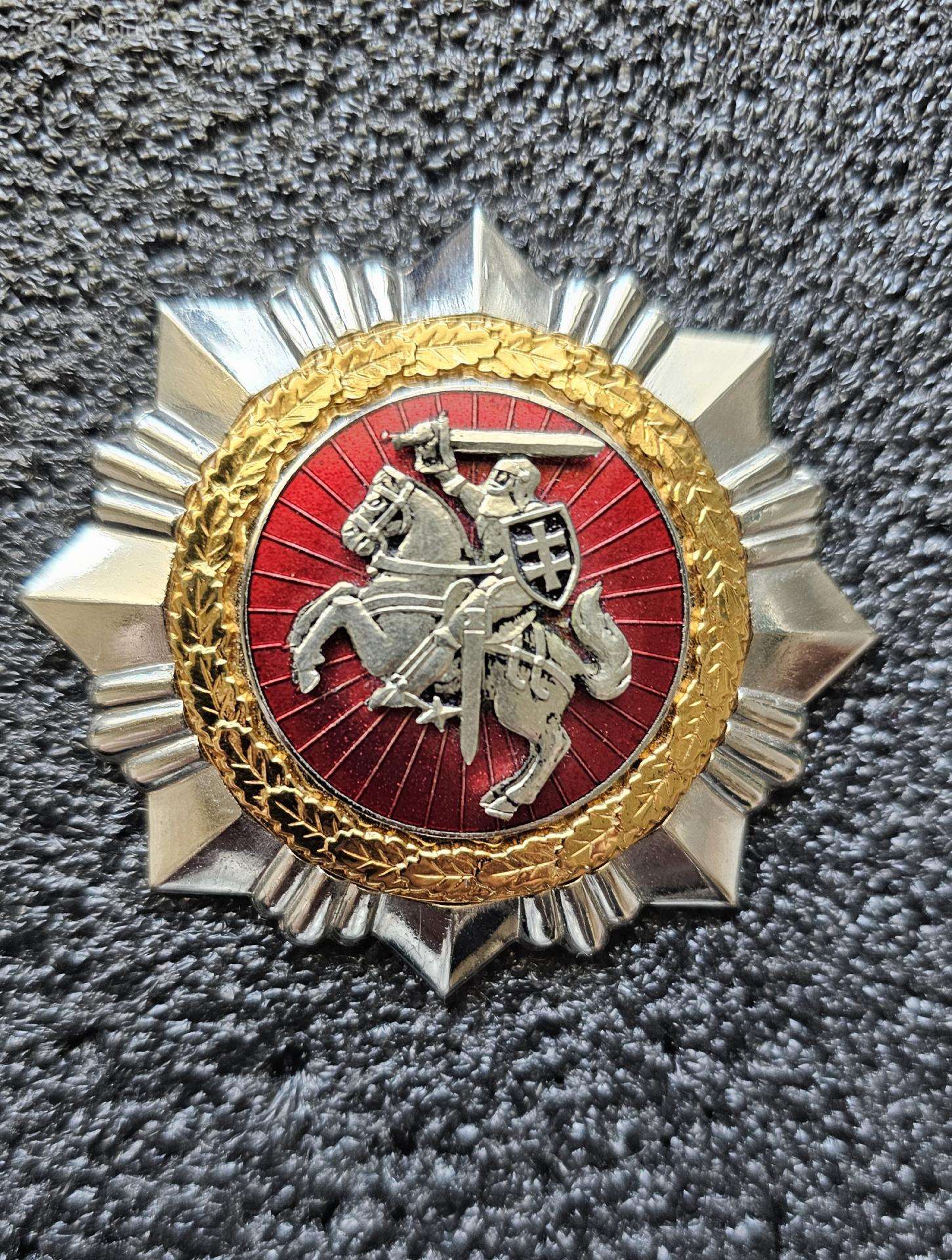 Krūtininiai ženklai.