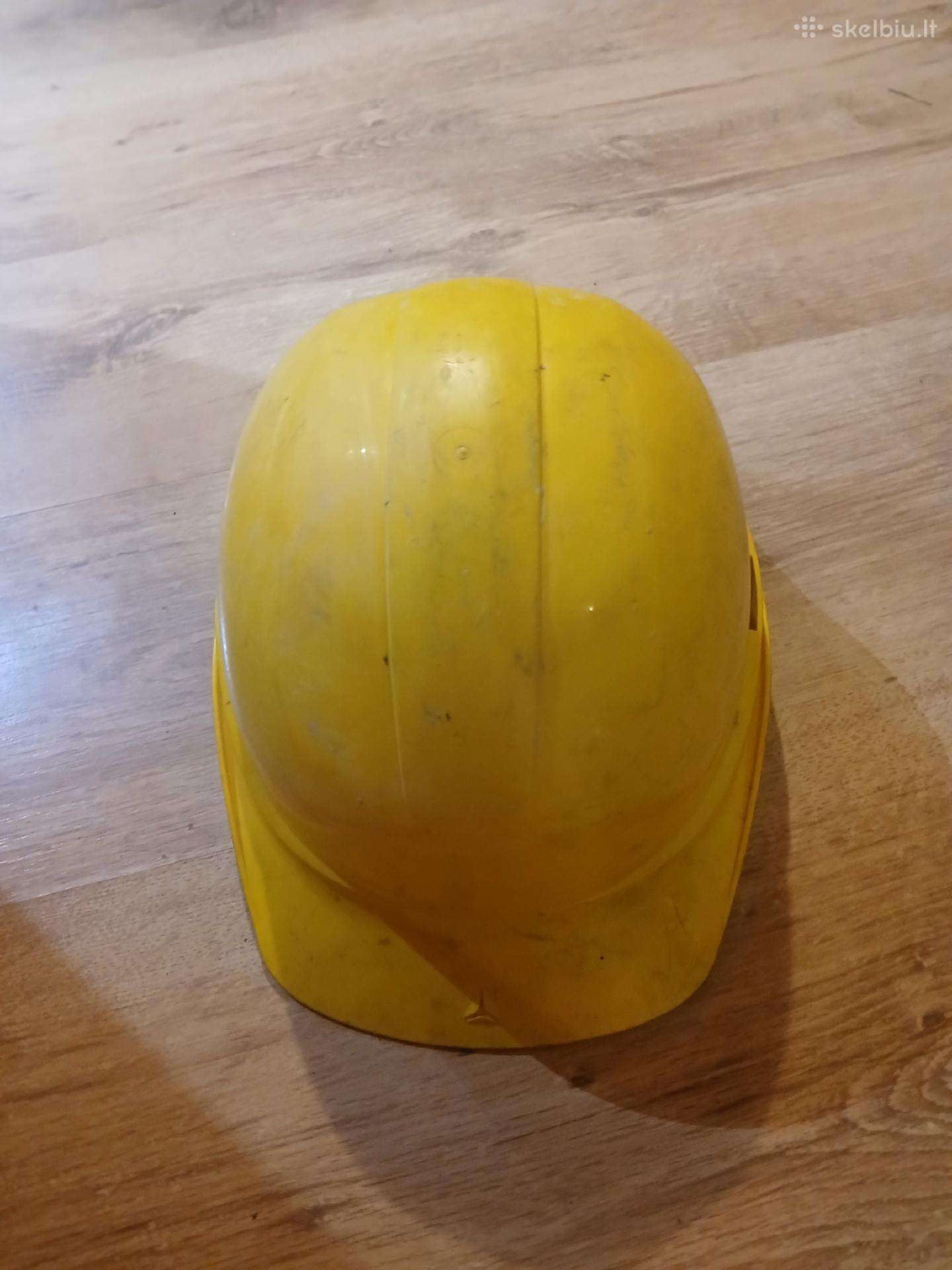 Parduodamas geltonas apsauginis statybinis šalmas.