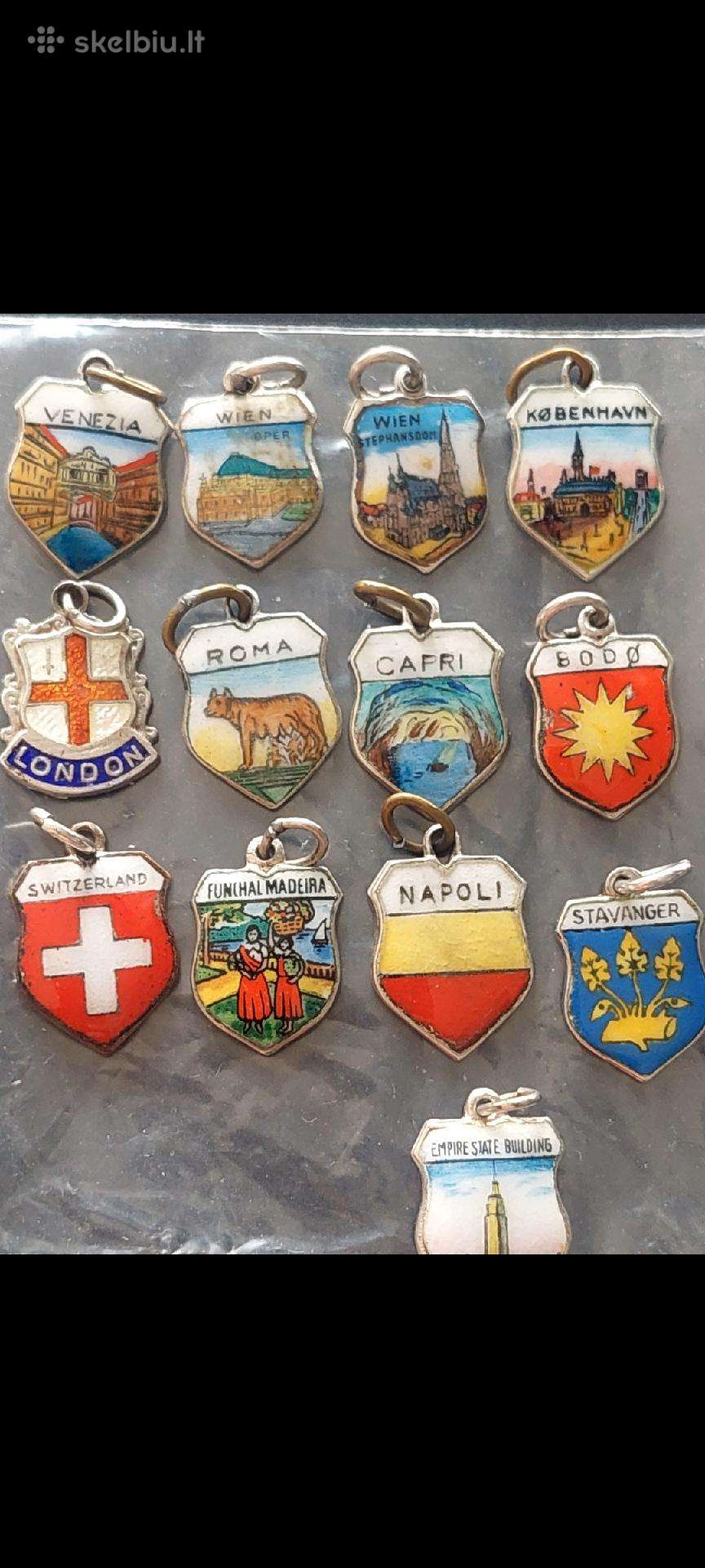 Sidabriniai turistiniai pakabukai