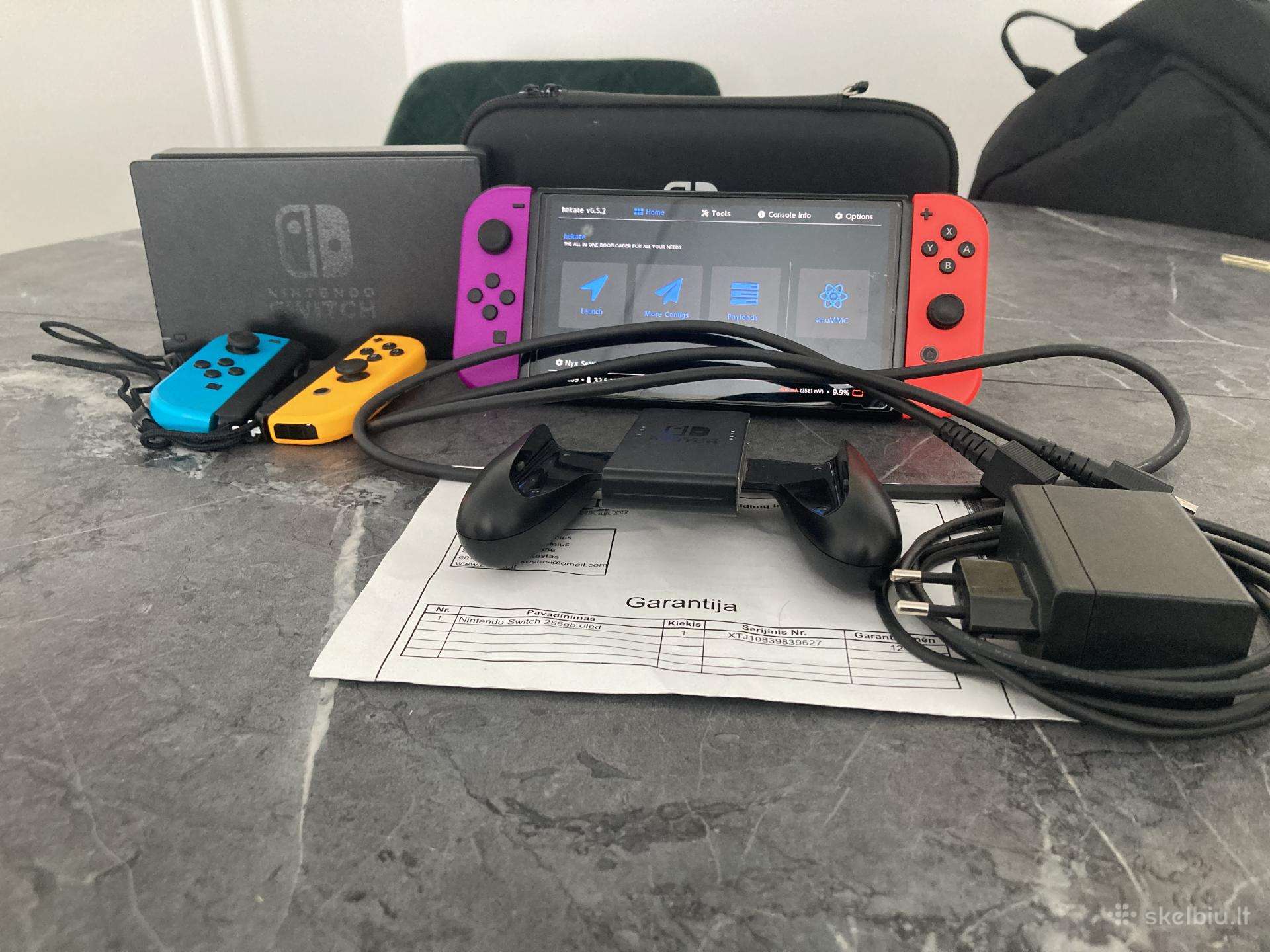Nintendo Switch Oled (atrištas)64gb+ 256 micro Sd