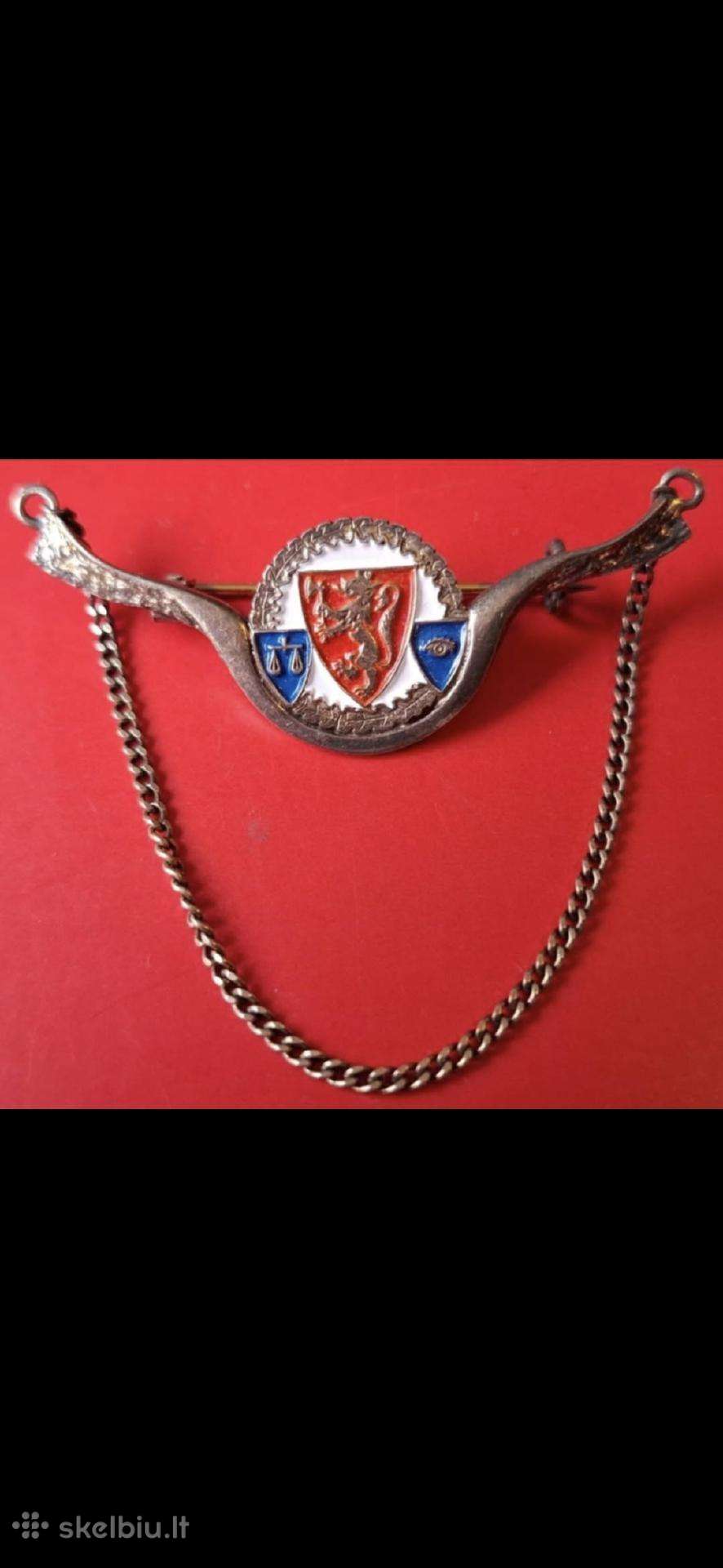 Zenklelis su Norvegijos policijos emblema