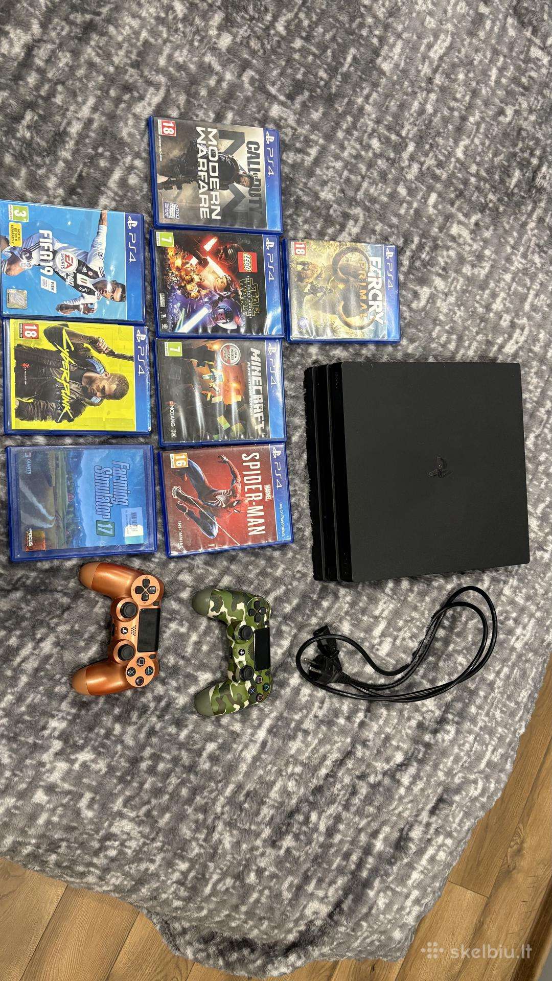 Playstation 4 Pro + 2 pulteliai + 9 žaidimai