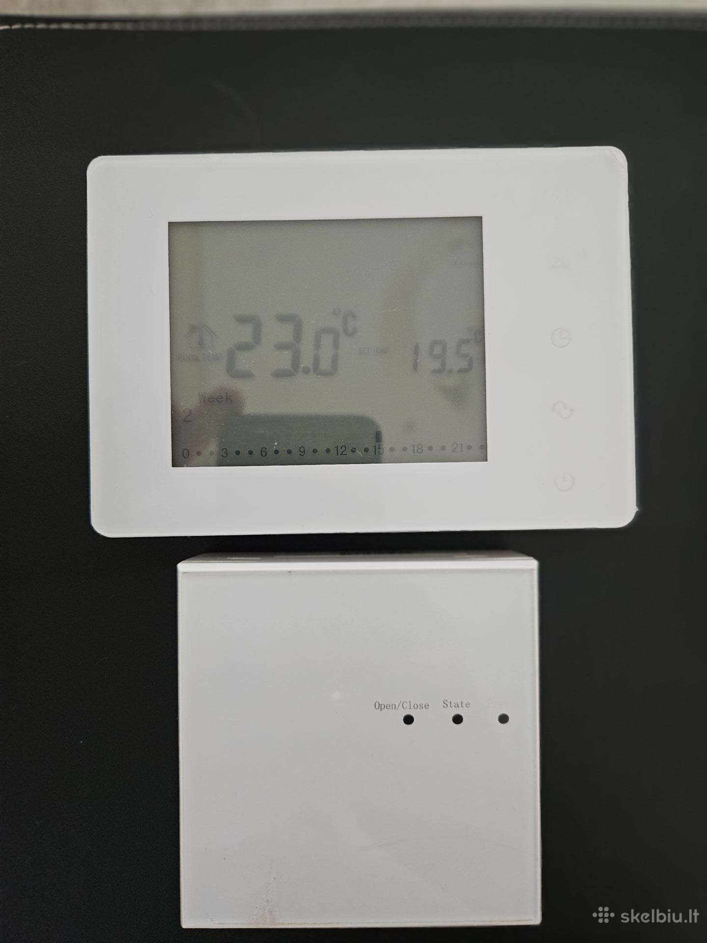 Bevielis termostatas