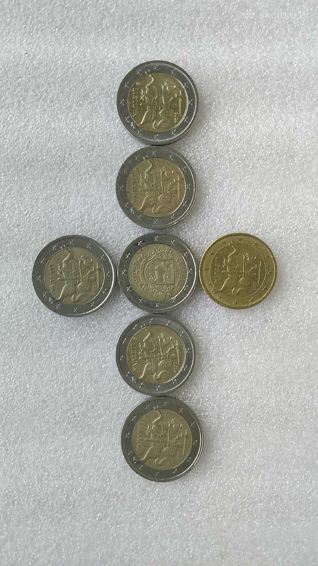 Monetos su defektais