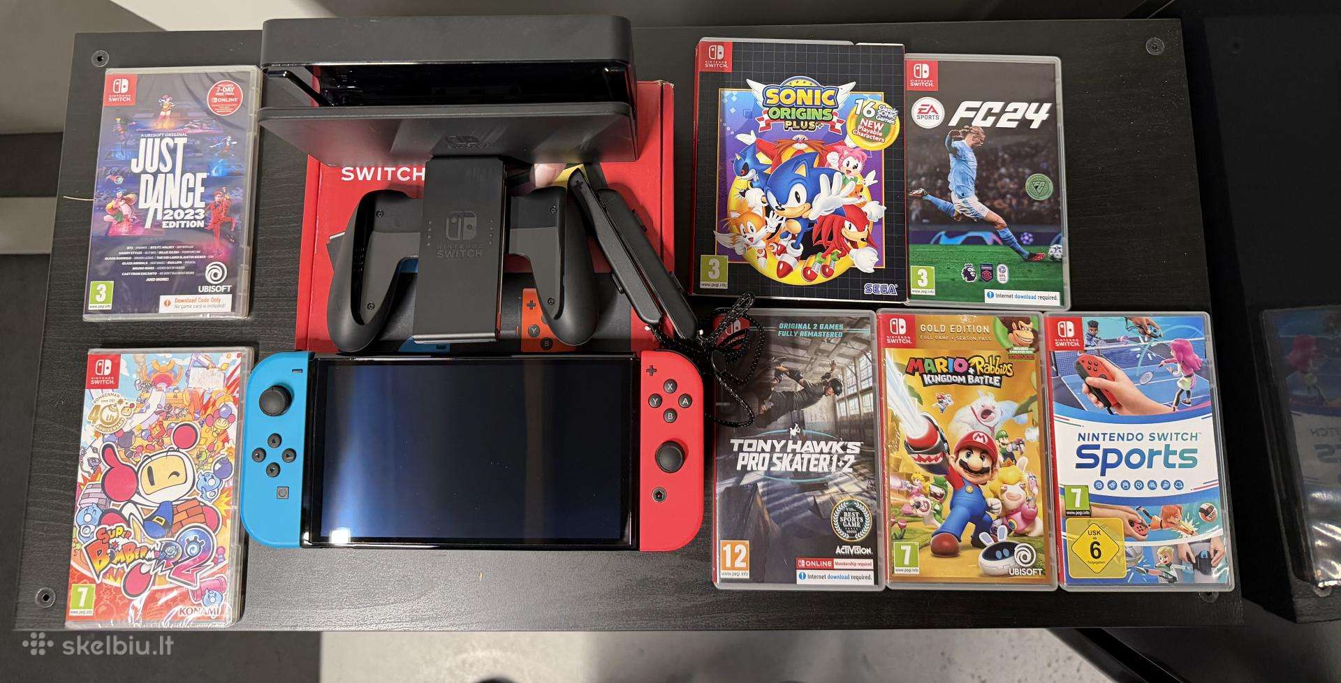Nintendo switch oled + 7 zaidimai