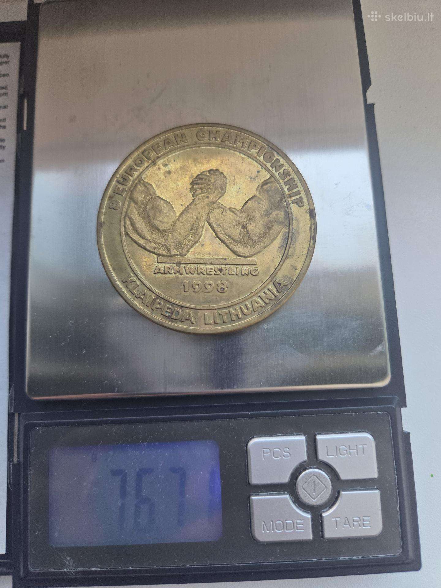 Eropos rankų lenkimo čempionato medalis