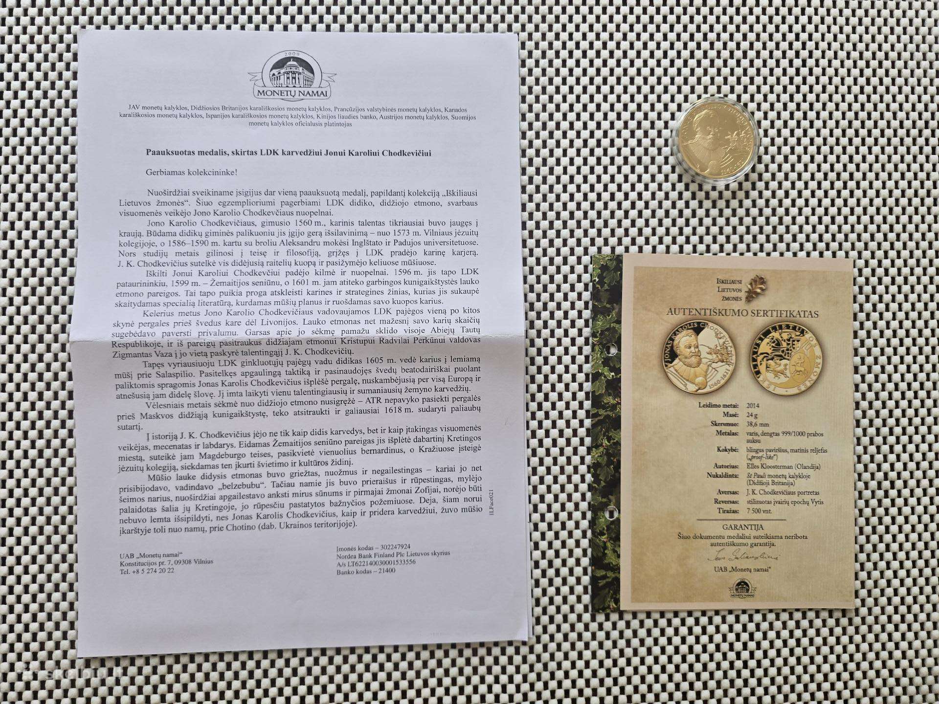 Moneta su autentiškumo sertifikatu