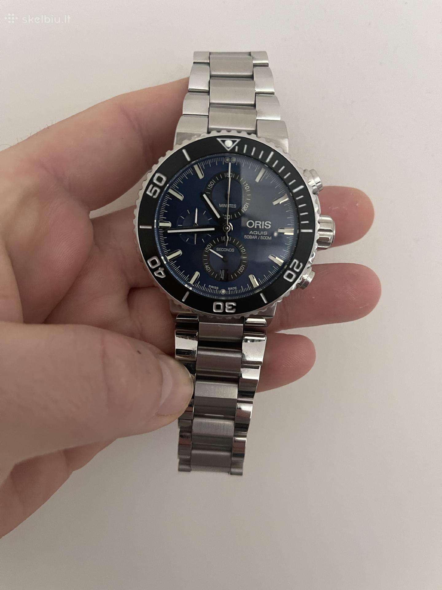 „oris“ laikrodis.
