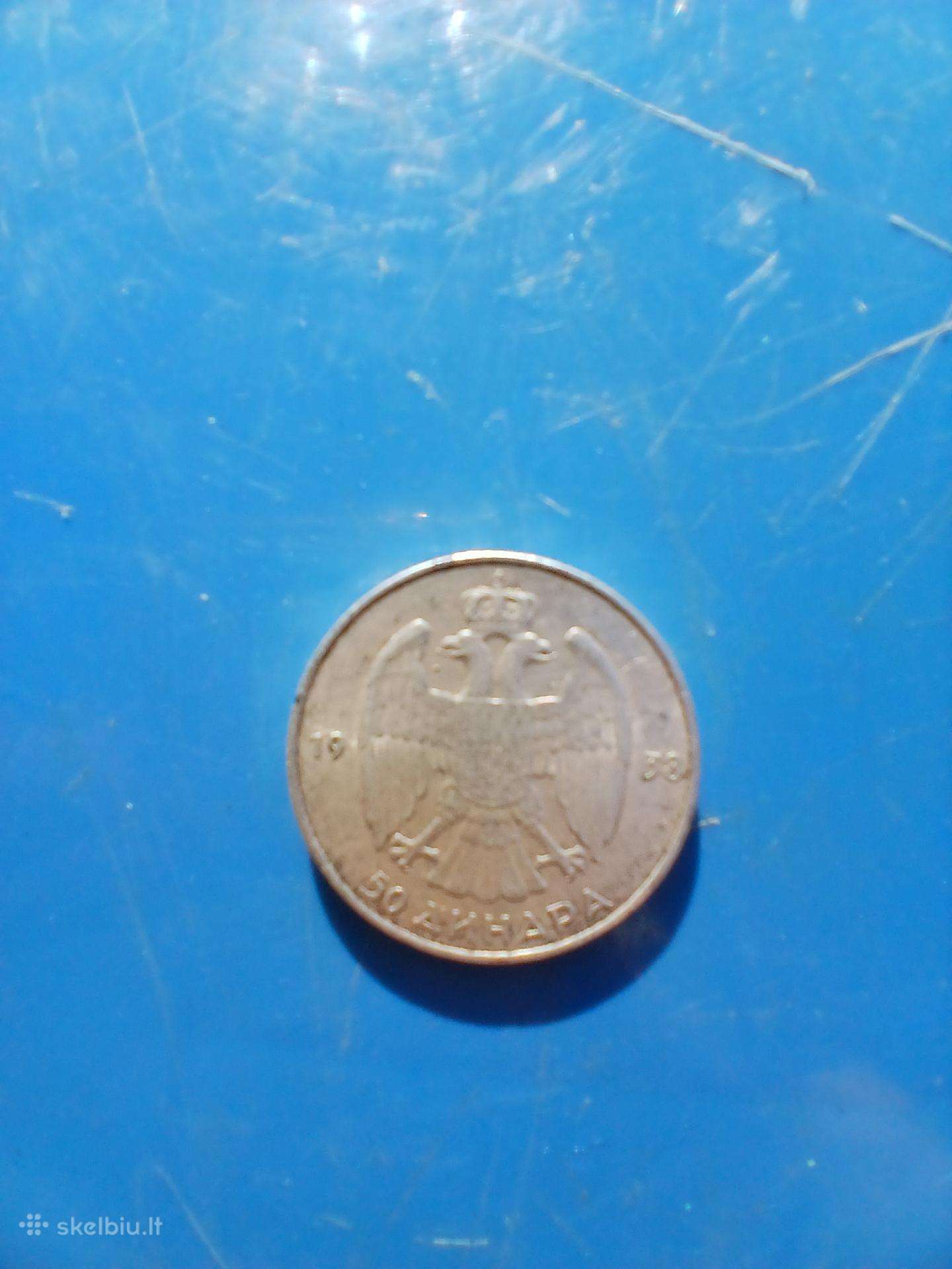 Ši moneta yra 50 dinarų sidabrinė