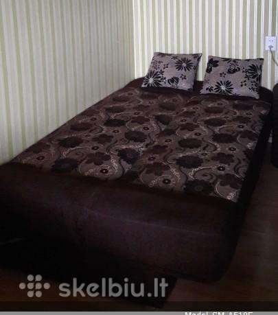 Dovanojama dvigulė sofa-lova