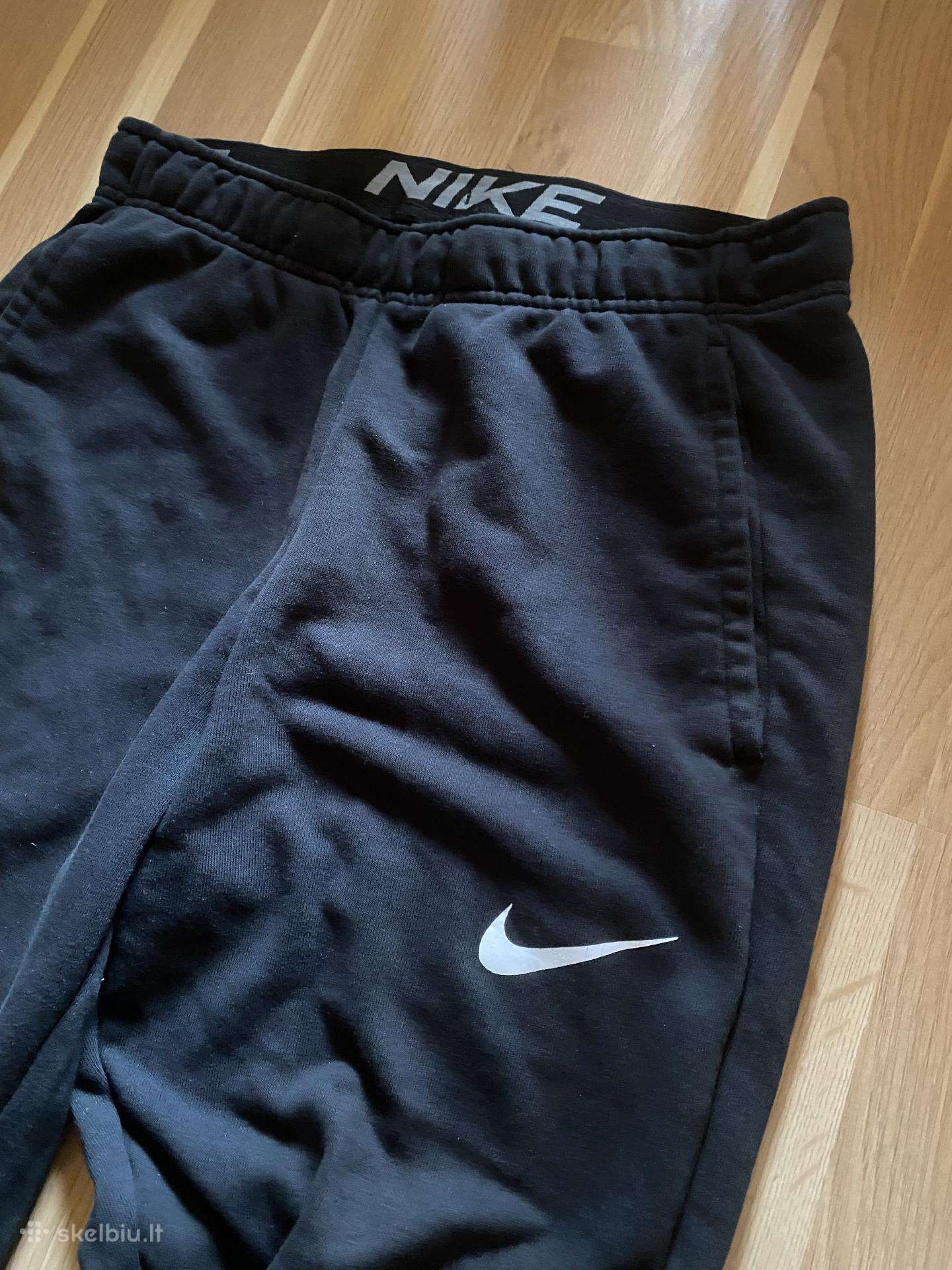 Nike kelnės
