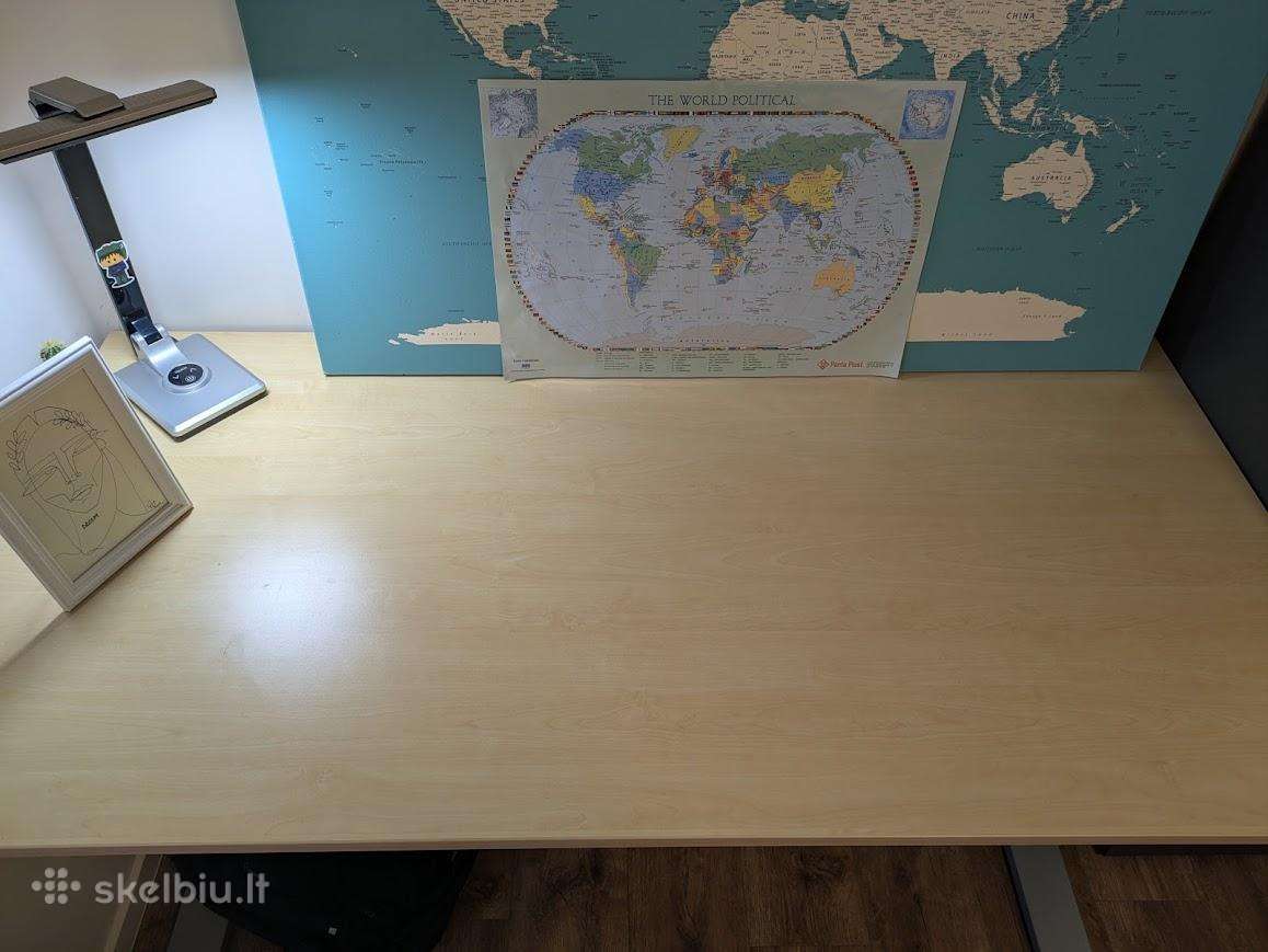 Reguliuojamo aukščio elektrinis stalas