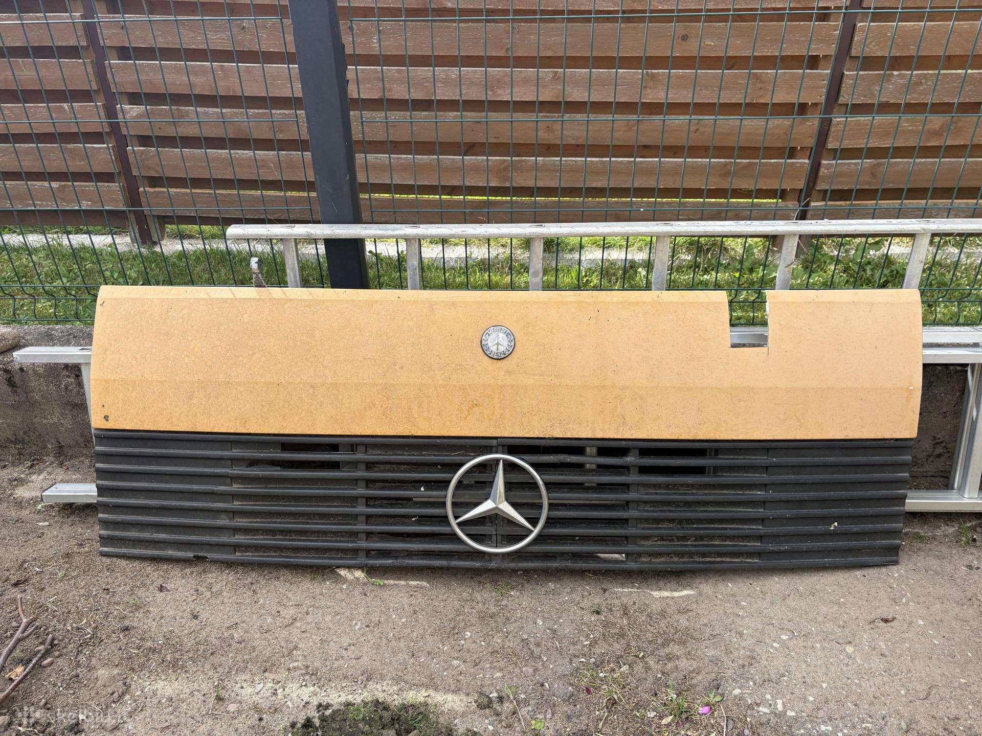 Grotelės ir Spoileris