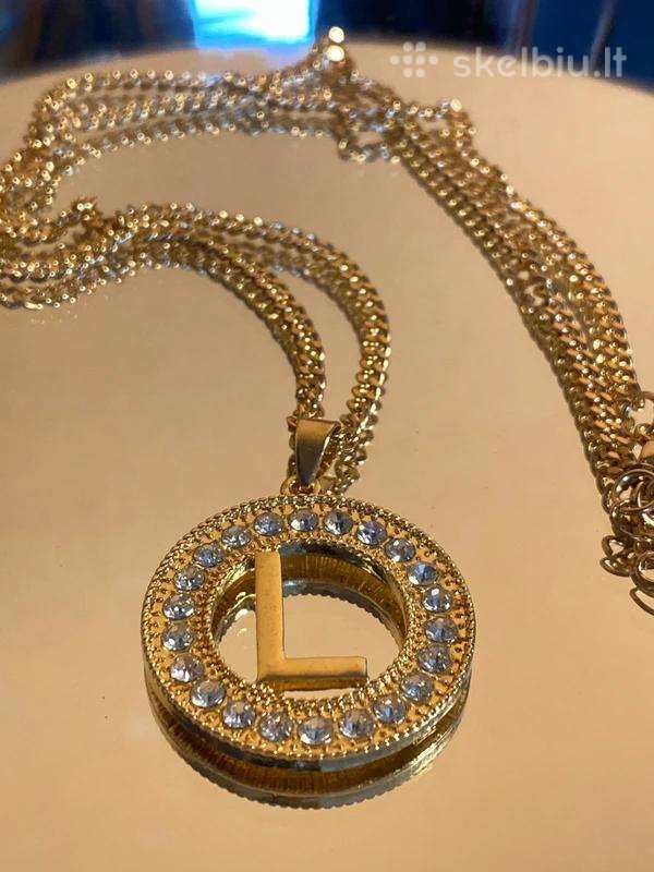 Moteriškas aukso spalvos talismanas medalionas