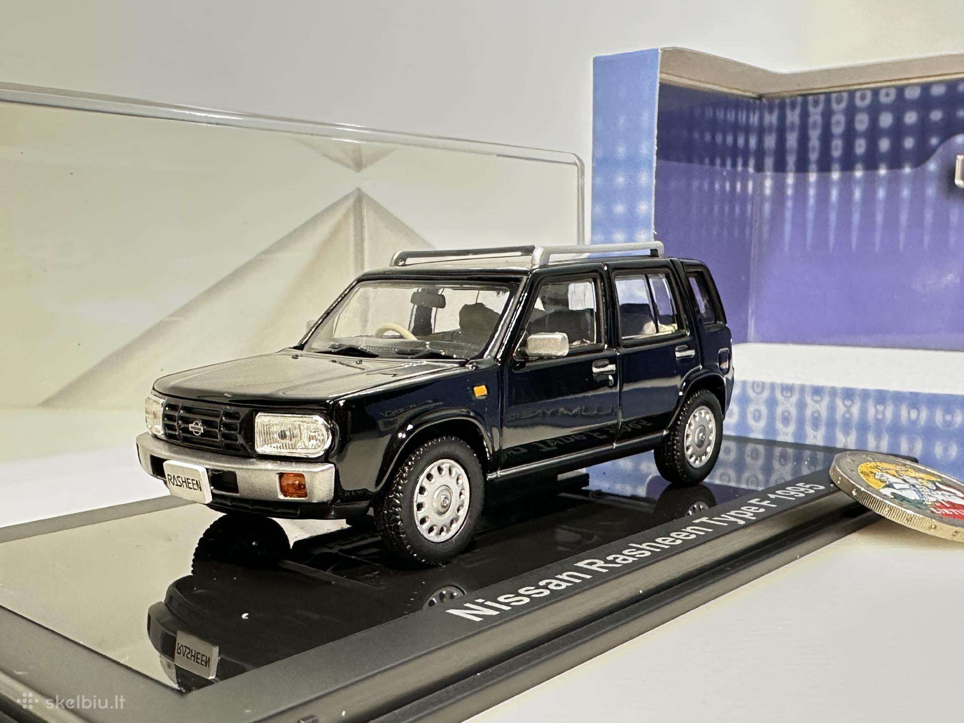 Nissan Rasheen Type F 1995 juoda 1:43 Norev